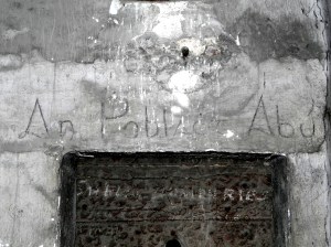 Painted over whitewash. Slogan in Irish ' An Poblacht Abu'. Located in Sighle Humphries's cell (Corridor 2, Middle Floor)