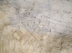 Two Tricolour flags (with a harp and 'IRA') located in a cell on Corridor 1 of the Top Floor.